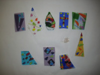 Jewelry pendants before they are fused.